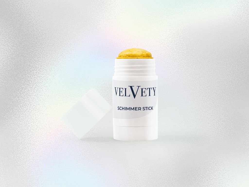 Geöffneter Shimmer Stick von Velvety mit goldener Textur.